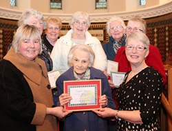 A presentation to Mrs Margaret Adams for 70 years service as Eglantine MU celebrates its 70th anniversary.