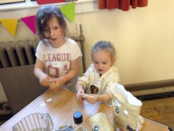 Making dough for bread during the Easter Kids' Club at St Mary Magdalene Parish.