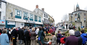 People gathered in Market Square, Lisburn for a short act of worship following the annual Good Friday ‘Carrying of the Cross March of Witness.'