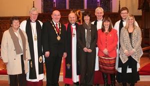 The Mayor of Lisburn, Alderman William Leathem, with Bishop Alan Abernethy and his wife Liz, Dean John Bond and his wife Joyce, Canon Sam Wright and his wife Paula and the Rev Simon Genoe and his wife Zara following the Service of Re-opening and Rededication at Lisburn Cathedral.