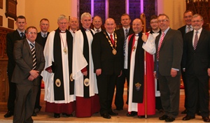 Clergy and representatives of the contractors, architects and other businesses involved in the renovations and refurbishment of the cathedral.