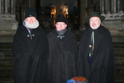 Dean John Mann, Rev Canon David Humphries and Paul Gilmore on a wet and dark Wednesday morning on the steps of St Anne's.