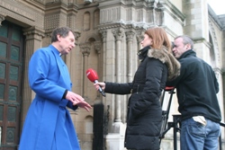 Dean John Mann being interviewed by the BBC on the steps of St Anne's before the Good Samaritans' Service.