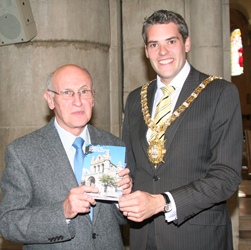 Guidebook author Norman Weatherall is congratulated on its production by the Lord Mayor Alderman Gavin Robinson.