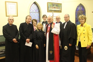 Rev Tracey McRoberts with Bishop Alan, clergy and parish representatives at her institution as rector of St Matthew's, Shankill. Photo: Shankill Mirror