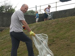 Diocesan Reader William Patton helping with the Beach Clean.