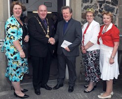 The Rev Nicholas Dark welcomes the new Mayor of Lisburn, Alderman William Leathem and his wife Kathleen to a special Thanksgiving Service at Magheragall Parish on Sunday morning 3rd June to celebrate the Queen's Diamond Jubilee.  Included are church wardens Roberta Campbell and Isobel McAuley (right).
