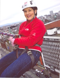 Claire Geoghegan looks relaxed and smiling as she steps over the precipice of the Europa Hotel!