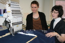 Many of the crosses were stitched frame by frame as Helen and Wilma demonstrate during the making of the pall.