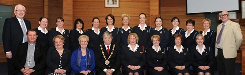 Lisburn Mayor, Councillor Brian Heading, pictured with leaders of St Paul's Girls' Brigade.