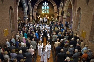 The service of institution in St John's, Malone.