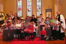 Families from the parishes of Ahoghill and Portglenone present their gifts for the Samaritan's Purse Christmas Appeal.