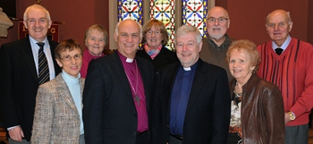 Bishop Ken Clarke pictured with some members of the ‘Bridge to Life' mission committee at the Maundy Thursday service.  L to R: Grace Mills (Rector's Churchwarden), Bishop Ken Clarke (Guest Preacher), Canon Ken McReynolds (Rector) and Mavis Gibbons.  (back row) Leslie Mills, Beth McIlroy, Rosemary Pulford (Mission Secretary), Victor McDonald and Neil Wilson.
