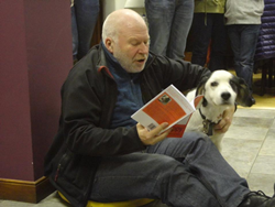 Storyteller the Rev Adrian McCartney and his dog Shep.