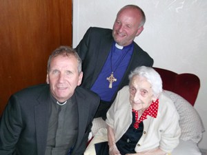 Cecilia with the Rev Robin Moore and the Bishop of Connor.