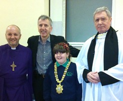 A young member of the choir, Cór Ghaelscoil na bhFál, which sang at the service with the Lord Mayor and clergy.