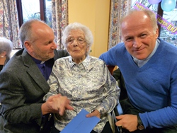 Ruby McMichael is congratulated on her 100th birthday by Bishop Alan and the Rev Bill Boyce.