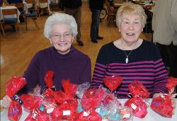 Isabel Kirkwood and Dorothy Anderson pictured with some of the cup cakes on display at their cake stall.