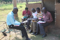 A group of pastors in discussion during the training session delivered by the Connor team.