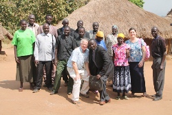 Members of the 2013 Connor Yei team David Gough and Judith Cairns with villagers in Longamere after Judith preached at the Sunday morning service there. The team was supported by Connor Mission Support Fund.