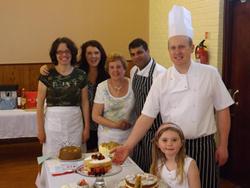 Judges at the great All Saints' bake off.