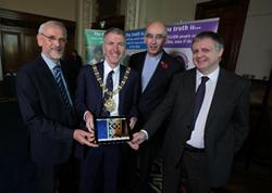 Philip Saunders (Ulster-Scots Language Society), Councillor Mairtin O Muilleoir (Lord Mayor), the Rev Stephen Lowry (BSNI Chair), and John Duffy (Pastor of a Belfast Church) at the celebration of the Digital Bible Library in the City Hall, Belfast.
