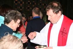 The Dean of Belfast, the Very Rev John Mann, who will lead the pilgrimage is pictured celebrating Holy Communion in the Church of All Nations during the 2011 Connor pilgrimage.