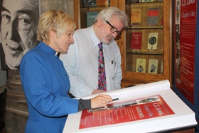 Cathedral librarian Paul Gilmore and Dean's Vicar the Rev Denise Acheson look at some of the reflections in the CS Lewis book.
