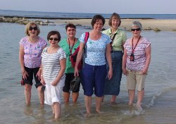 Paddling in the Mediterranean at Caesarea are: Joan Rogers, Kate Irvine, Christine Jones, Fiona Forde, Helen Mann and Carol McCullough.