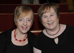 May McConnell and Ann King, members of Lisburn Harmony Ladies Choir, pictured enjoying a blue grass music performance in Lisburn Cathedral.