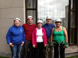 Barry Dodds with Leah Batchelor's mum Allison, on the right, and other brave abseilers before the big challenge.