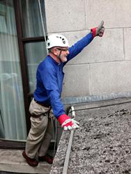 A thumbs up from former Archdeacon Barry Dodds as he gets ready to abseil down the Europa Hotel.