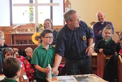 The Rev Andrew Sweeney, rector of Ballymoney, at the Dunseverick Primary School Assembly in Dunseverick Parish Church.
