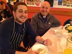 Bishop Alan and chef Aaron Heasley at the curry night during Holy Week at Lisburn Cathedral.