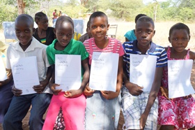 Children proud of their certificates from the Open Schools Worldwide which you can read about below.
