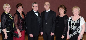 Pictured prior to a ‘Musical Extravaganza' in Christ Church Parish, Lisburn, are the Rev John Pickering and Lisnagarvey Operatic Society members Heather Campbell, Kathleen Algie, Roy McIlwrath (President), Jennifer Anderson (Chairperson) and Gwen Gibson.