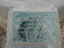 The plaque showing the well was funded by Holy Trinity Parish, Woodburn.