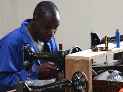 Tools for Solidatity refurbishes old sewing machines for use in Africa.