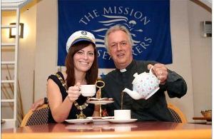 Lord Mayor Nichola Mallon and Rev Colin Hall-Thompson enjoy a cuppa.