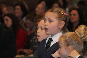One of the Choir School pupils singing Jonah-Man Jazz at Belfast Cathedral.