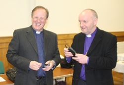 The rector of Bushmills, the Rev Canon George Graham, and Bishop Alan prepare for the first of this year's Lenten seminars, which took place in the Dunluce Parish Centre.