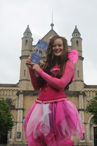 Prunella the Pink Pixie from Belfast Community Circus School, in the Cathedral Quarter, helps launch St Anne's new visitor experience.