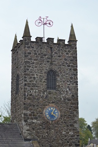 Pink bike atop the tower of St Cedma's in Larne!