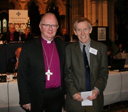 Judge Derek Rodgers receives the award for best parish magazine from Archbishop Clarke on behalf of St Patrick's Jordanstown.