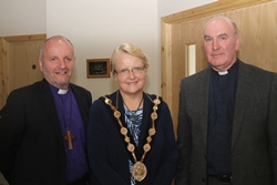 The Mayor of Lisburn, Councillor Margaret Tolerton, is greeted the Bishop Abernethy and the rector of St Hilda's, the Rev David Boyland.