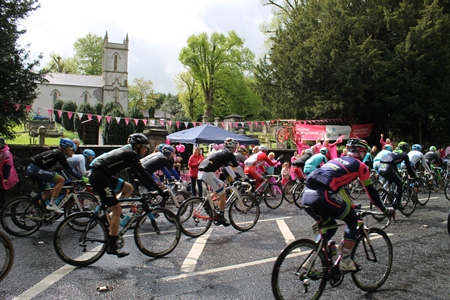 Giro cyclists speed past St Patrick's Church, Templepatrick.