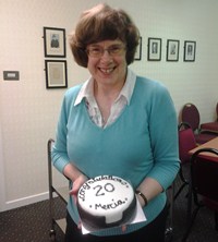 Mercia with the anniversary cake presented to her at a parish fellowship meeting in Carnmoney.