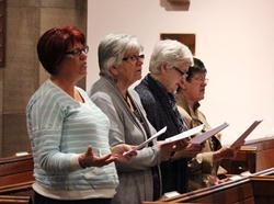 Ladies sing during the Ballymena Pentecost Service.