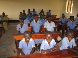 Children of Mongo school get down to work in their new classrooms complete with new desks and benches.