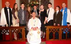 The Bishop of Connor, the Rt Rev Alan Harper, Rev Canon Ernest Harris - Rector of Ballinderry Parish (left) and Dr Fred Ruddell - Diocesan Reader (right) are pictured with seven people from Ballinderry Parish who were confirmed in Ballinderry Parish Church.
